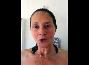 Buxom grandmother taking a shower. Looks
