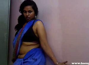 Naughty indian Lily in blue sari in..