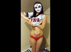 Young lady Cougar in scary mask nails